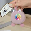 Chaveiro de Pelúcia com Rosto Sorridente e Flor Colorida Boneca Bola de Pelo Fofa Pingente para Bolsa Mochila Carro