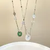 Novo estilo chinês Jade colar de fivela de segurança 2024 novo nicho feminino design sentido clavícula cadeia internet celebridade colar