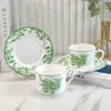 Suministro Directo Transfronterizo D Moda Juego de Tazas de Café de Porcelana Hueso Estilo Europeo Juego de Té de la Tarde Lirio del Valle Café 2 Tazas 2 Platos Caja de Regalo