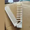 Cepillo de dientes para el hogar y venta al por mayor de cepillos de dientes Set de artículos de tocador desechables para hotel Peine plegable Portátil de viaje para niñas