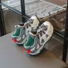 Zapatos Deportivos Infantiles con Hebilla Giratoria Modelo Nuevo Primavera/Verano 2026 Sandalias Deportivas Huecas Transpirables para Niños y Niñas Zapatos Casuales para Exteriores