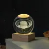 Bola de cristal personalizable grabada con láser 3D con luz nocturna emisora de luz, adorno de cristal de escritorio y decoración que realza el ambiente
