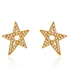 Elegantes pendientes de lujo de alta gama con forma de estrella asimétrica de cinco puntas, pendientes creativos de estrella con circonita brillante