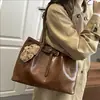 Bolsa Tote Casual de Grande Capacidade para o Dia a Dia de Mulheres 2026 Primavera Novo Estilo High-End Elegante Simples Ombro Axila