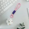 Estilo Minimalista Popular Cuerda Trenzada Tejida a Mano Lanyard con Bloques de Color Llavero Funda de Teléfono Correa de Muñeca Portátil Accesorio de Nicho de Moda