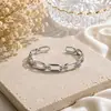 Pulsera Abierta de Acero de Titanio Europea y Americana para Mujer de Gama Alta Nicho Versátil Creativa Personalidad Exagerada Moda Joyería de Mano al por Mayor