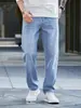 2026 Comercio Exterior Verano Hombres Vintage Versátil Azul Pantalones Casuales Elásticos Estilo Americano Color de Contraste Jeans Venta al por Mayor