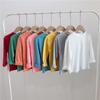 2022 otoño e invierno camiseta de algodón para niños de cuello redondo manga larga color sólido niños y niñas bebé camiseta base niñas primavera y otoño