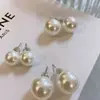 Pendientes de perla estilo fiebre S999 plata pura de Casa de Plata, lujo ligero con un toque de alta gama, estilo francés de nicho, populares en línea