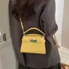 Bolsa de Mão Pequena Elegante de Alta Qualidade para Mulheres 2026 Nova Bolsa Transversal Versátil Bolsa Kelly Super Popular Moda Bolsa Tote Pequena
