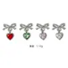 Nuevo Estilo de Lujo Ligero Celebridad de Internet Corazón Lazo Arte de Uñas Rhinestone Hueco Colgante Diseño Portátil Uñas DIY Accesorios Mayoreo