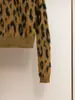 Top de Malha Feminino Outono e Inverno Novo Estilo Francês Sexy Animal Print Leopardo Pelúcia Gola Redonda Curto Shenzhen Nanyou