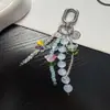 Colgante Único de Tulipán y Mariposa con Cuentas de Nuevo Estilo para Mujer, Funda de Teléfono Creativa y Encanto para Bolso