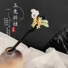Horquilla de conejo de osmanthus nueva china moderna para mujer de alta calidad imitación ébano horquilla estilo Zhao Liying palillos estilo antiguo