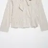 Falda corta de nueve puntos y camisa a rayas para mujer, estilo europeo y americano transfronterizo, nueva, moderna y elegante, 2026, con detalle de lazo 4387260