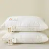 Almohada de hotel Clase A con núcleo 100% algodón, almohada de soporte cervical individual y doble de algodón puro, almohada para uso doméstico con núcleo de algodón y seda de plumas, almohada alta y almohada baja