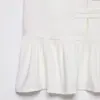 Item de Venda Quente Transfronteiriça do Aliexpress Nova Coleção Primavera 2026 Top Feminino Estilo Saia Curta com Botões Banhados a Ouro 0387062