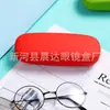 Al por mayor versión coreana para hombres y mujeres estudiantes ins simple fresco lindo color sólido anticaída antideslizante portátil estuche para gafas logo gratis
