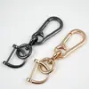 Creativo Sencillo Colgante de Cintura para Llaves de Coche Gancho para Bolso Hebilla Colgante Accesorios Dos Llaveros de Aleación de Zinc Fabricante Venta al por Mayor