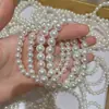 Novo Pulseira Clássica de Pérola Imitação Simples e Fashion Leve Luxo Leve Luxo Alto Padrão Versátil Contas de Concha Anel Liso Joias Atacado
