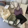Bolso de lona lavado estilo japonés transfronterizo nuevo, gran capacidad, diseño simple, adecuado para ir al trabajo y se puede usar como bolsa de compras para estudiantes
