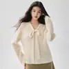 Nueva colección de otoño e invierno de ropa para mujer: suéteres de punto de cachemira con cuello en V y detalle de corbata, suéteres de color liso, tops sencillos y elegantes, versátiles y modernos
