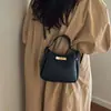 Transfronterizo 2026 Nuevo Estilo Simple y Elegante Ultra-Trendy Bolso de Mano para Oficina Chic Retro Patrón Lichi Moda Bolso Cubo