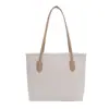 Bolsa Feminina Nova de Tricô Outono e Inverno Grande Capacidade Bolsa de Mão Cor Sólida Versátil Bolsa de Trabalho para o Dia a Dia Bolsa Transversal Texturizada