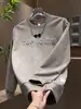 Sudadera Pulóver Versátil de Moda Nueva Otoño e Invierno 2025 para Hombre Top Casual de Manga Larga con Estampado de Letras Manchadas de Acero Tendencia de Moda