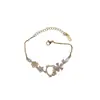 Pulsera de Diamante Rosa Sakura Microincrustado Hello Kitty para Mujer, Lujo Ligero, Exquisita, Moderna, Dulce y Linda Joyería de Gato