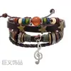 Pulsera de cuero de estilo étnico de moda, con cuentas trenzadas multicapa, una estrella de cinco puntas y dijes de notas musicales.; pulsera ajustable