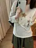Camiseta casual de manga larga color beige con cuello redondo y estampado de estrellas, de Tencel, protección solar, verano 2026, holgada, adelgazante, transparente
