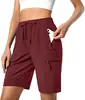 Shorts esportivos leves de secagem rápida para mulheres europeias e americanas, para camping, viagens, golfe, com bolsos com zíper e design casual à prova d'água