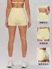 Shorts de yoga transfronterizos europeos y americanos con acabado cepillado para mujer, con un diseño sin costuras, ajustado al cuerpo, de cintura alta y que realza los glúteos, adecuados para deportes, running, fitness y secado rápido. 5555