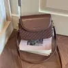Bolso cuadrado pequeño de alta calidad transfronterizo para mujer, nuevo bolso cruzado versátil de moda otoño 2026, bolso de mano exquisito