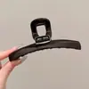 Elegante pinza de garra floral para peinado semi-recogido, nuevo modelo 2026 para mujer, pinza de tiburón de tamaño mediano para la parte trasera de la cabeza, accesorio para el cabello