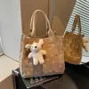 Bolsa de almuerzo de pana de gran capacidad para mujer, nuevo diseño moderno y elegante 2026, bolsa tipo tote portátil, bolsa para lonchera de estudiante