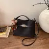 Bolsa Pequena Retro Transfronteiriça para Mulheres 2026 Nova Coleção de Primavera Versátil Bolsa de Mão para o Dia a Dia Bolsa Saco Bolsa de Ombro Transversal Texturizada