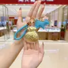 Llavero de Oro Puro 999 Creativo de Moda Colgante de Oro Bolso de Riqueza Diaria Bolsa de la Suerte Encanto Concha de Agua Mismo Estilo