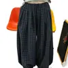 Novedades de otoño de alta gama para mujer de Dongdaemun, Corea: pantalones casuales a cuadros de cintura elástica estilo relajado