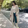 Casaco de Lã Feminino de Comprimento Médio 2024 Outono e Inverno Novo Estilo Hepburn Elegante Pequeno Coreano Solto Casaco de Lã