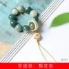 Colgante para teléfono móvil DIY de raíz de Bodhi especificaciones del colgante 1.2 cuentas de rosario chino para hombres y mujeres fabricantes de joyas para jugar Wen al por mayor