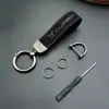 Colgante de Llavero de Cuero Gamuzado de Gama Alta para Coche Llavero con Logo de Coche Decoración de Llavero Colgante de Cintura de Metal Venta al por Mayor