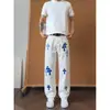 Jeans masculino estilo high street americano com estampa cruzada, novo modelo de verão, marca trendy de luxo leve, calças retas soltas que afinam