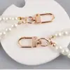 Llavero directo de fábrica hebilla de puerta colgante para teléfono móvil diy perla de imitación bolsa pequeña corta cartera muñeca cadena de mano venta al por mayor