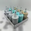 Botella Redonda de PP de Alta Calidad para B&B con Patrón de Flujo Tricolor, Botella de Loción Plateada de Gama Alta, Presurizador para Botella de Champú y Gel de Ducha