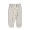 Pantalones de bebé minizone Clase A 2026 nuevo estilo de verano pantalones casuales para bebé caricatura versátil aire acondicionado pantalones largos