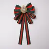 Estilo transfronterizo más vendido broche de corsage con lazo de pedrería a rayas decoración para camisa corbata cuello accesorios de flor