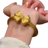 Nova Pulseira Retro Estilo Chinês com Laço Tridimensional e Diamantes Brilhantes, Cor Dourada, Toque Elegante e Luxuoso, Joia de Pulseira de Luxo Leve para Outono e Inverno