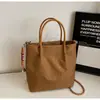Bolso de Mano para Escalada Estilo Japonés para Mujer 2026 Nuevo de Gama Alta Atmosférico Cuadros Lona de Nylon Bolso para Viajes de Negocios Moderno